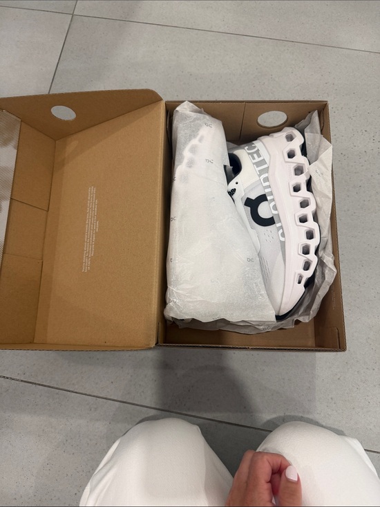 On Running Shoes - On Running White and Black Cloud-Inspired Sneakers